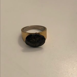 Gold ring with black stone